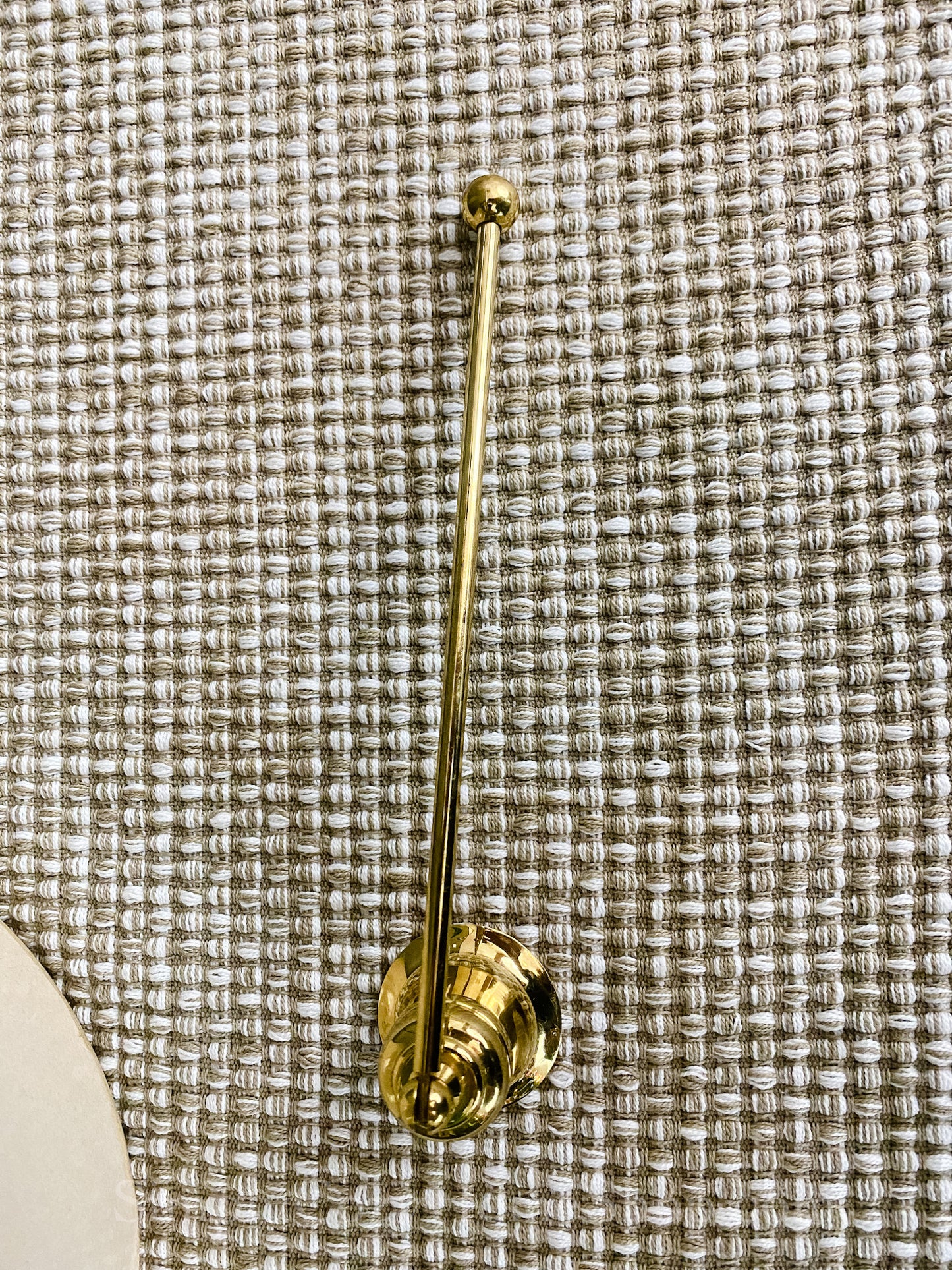 Small brass candle snuffer