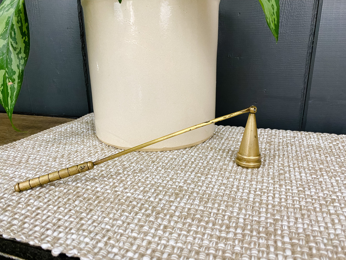 Long vintage brass candle snuffer
