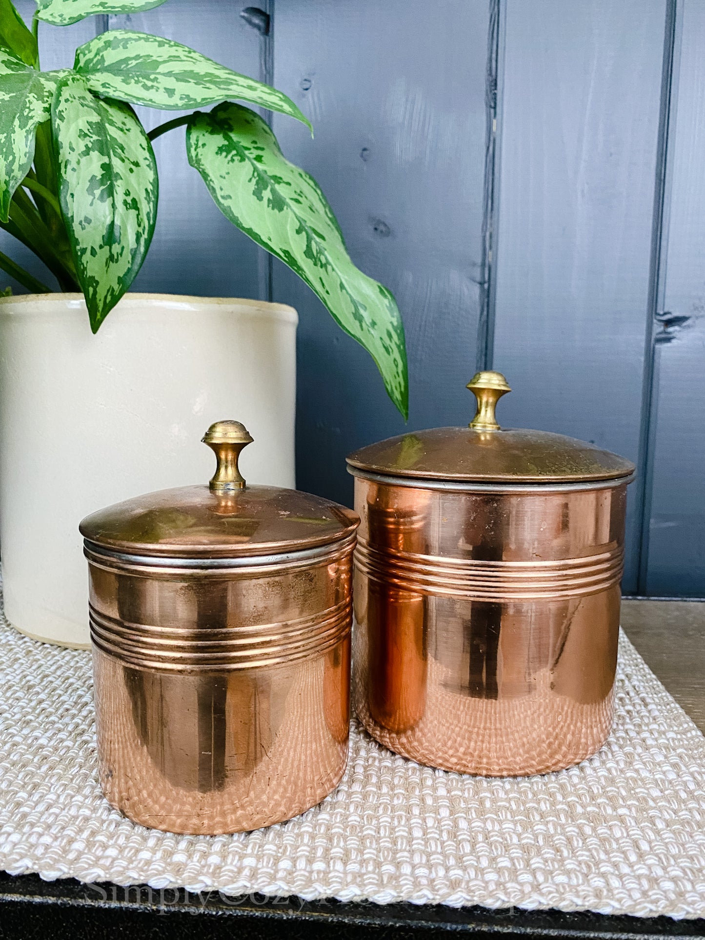 Set of 2 vintage copper canisters with lids